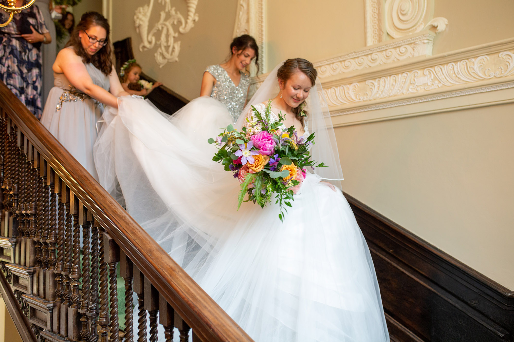 A gloriously colourful and fun wedding at Crowcombe Court with stunning florals, images by Somerset photographer Martin Dabek