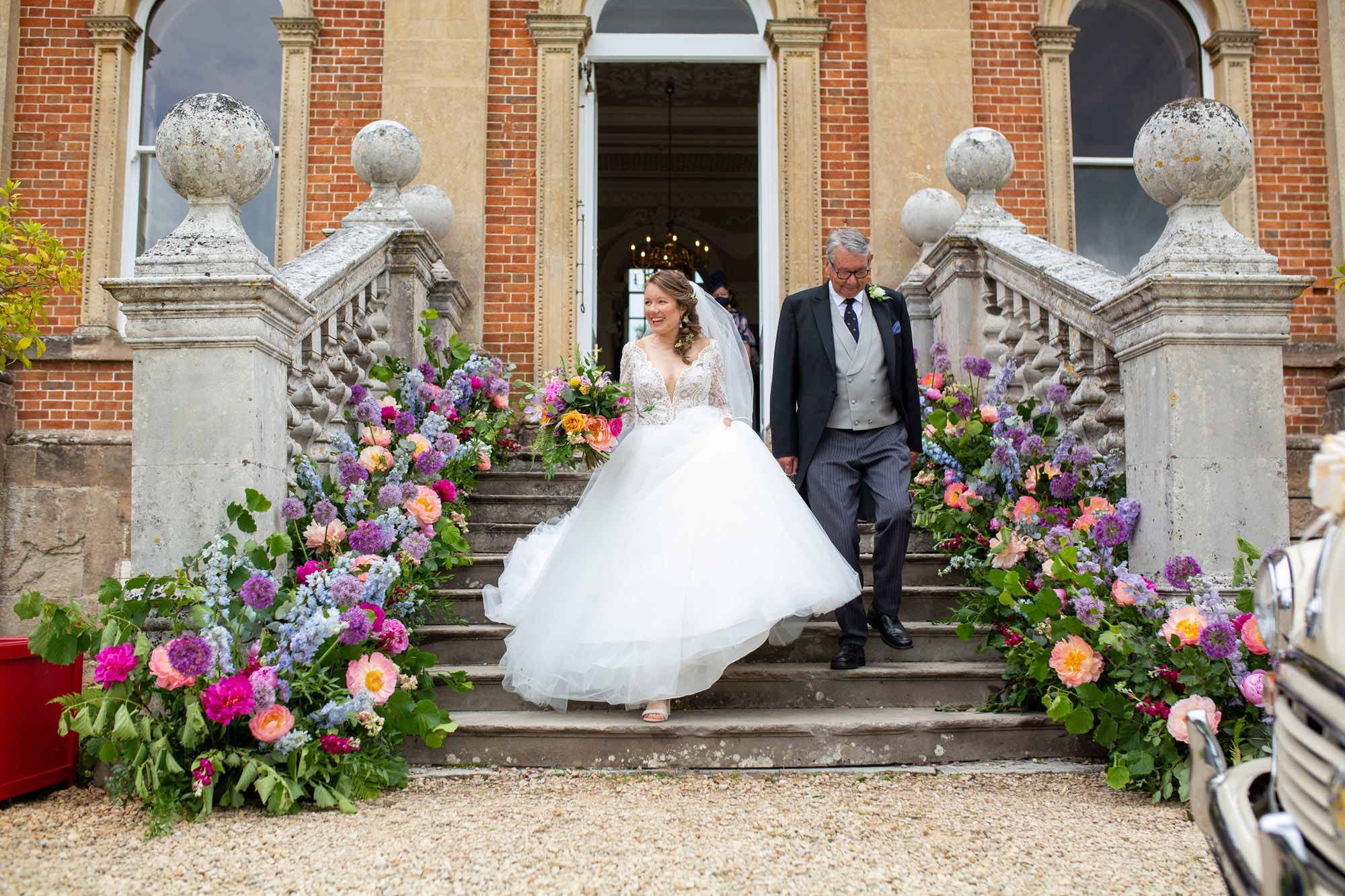 A gloriously colourful and fun wedding at Crowcombe Court with stunning florals, images by Somerset photographer Martin Dabek