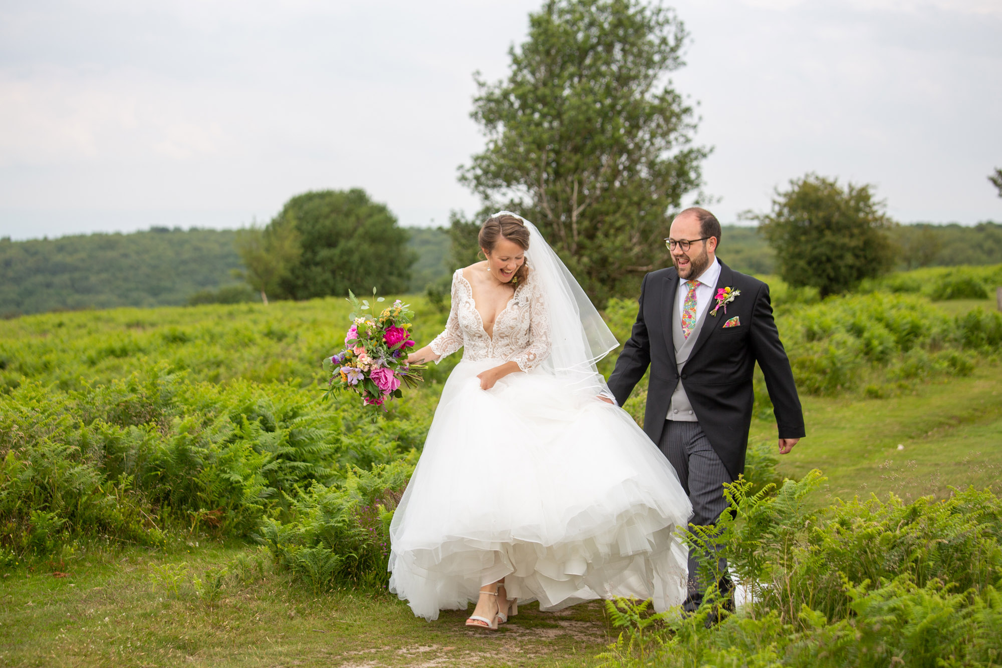 A gloriously colourful and fun wedding at Crowcombe Court with stunning florals, images by Somerset photographer Martin Dabek