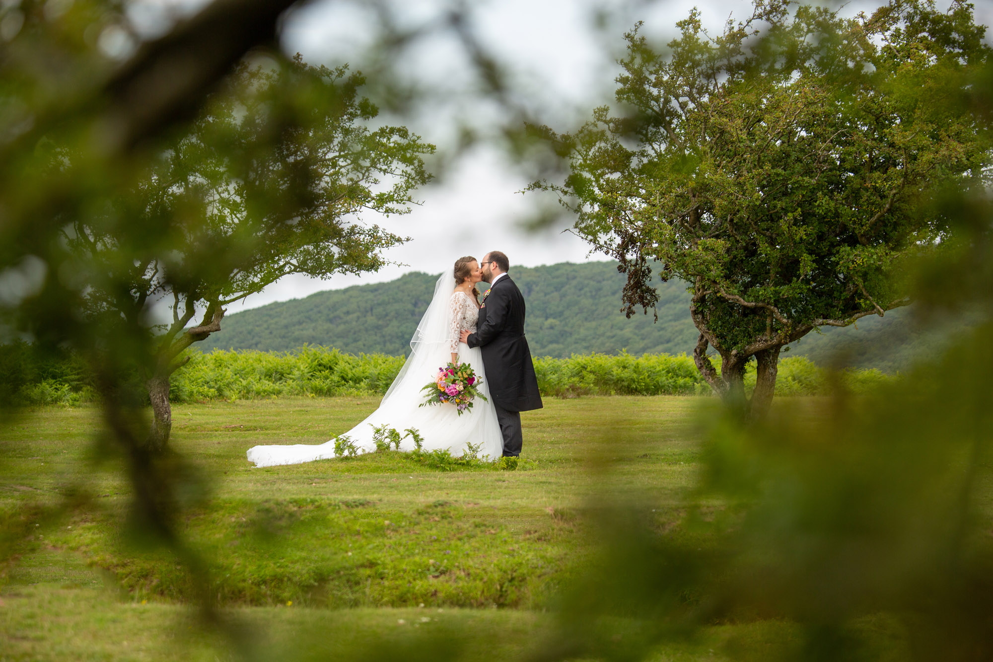 A gloriously colourful and fun wedding at Crowcombe Court with stunning florals, images by Somerset photographer Martin Dabek