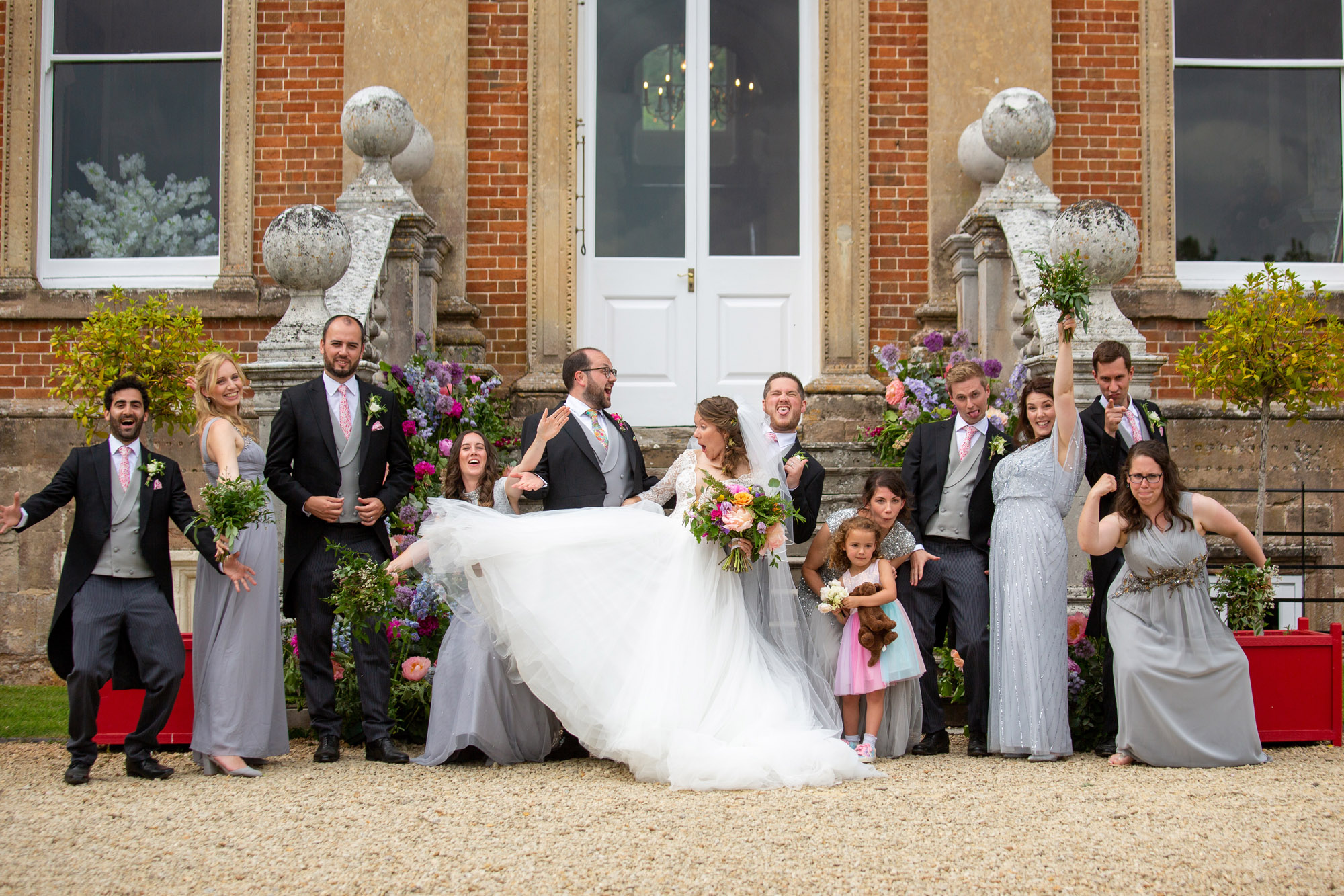 A gloriously colourful and fun wedding at Crowcombe Court with stunning florals, images by Somerset photographer Martin Dabek