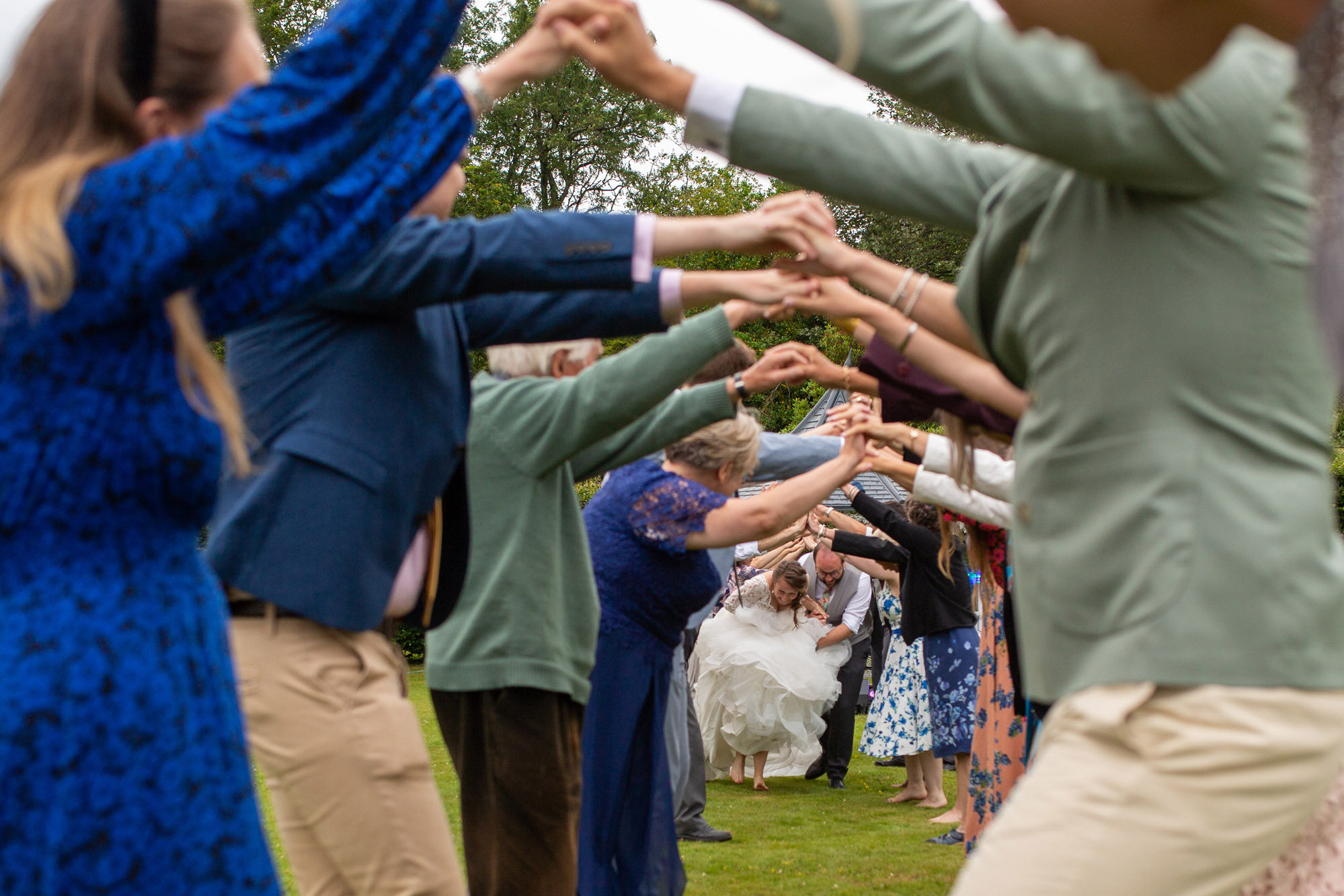 A gloriously colourful and fun wedding at Crowcombe Court with stunning florals, images by Somerset photographer Martin Dabek