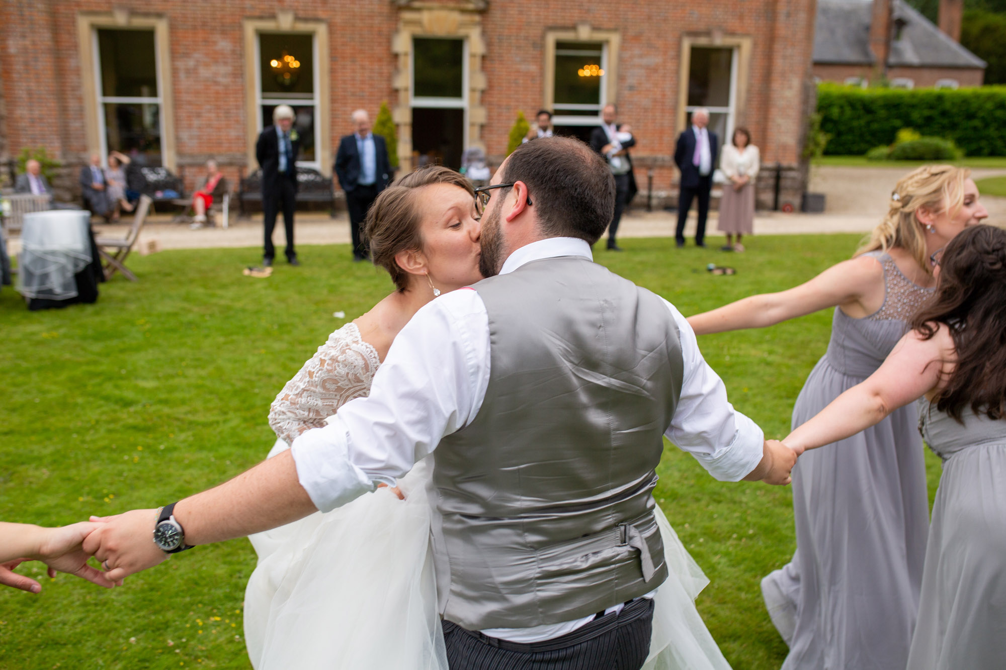 A gloriously colourful and fun wedding at Crowcombe Court with stunning florals, images by Somerset photographer Martin Dabek